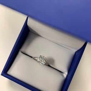 Charles and Colvard 2 ct/8mm FB Solitaire